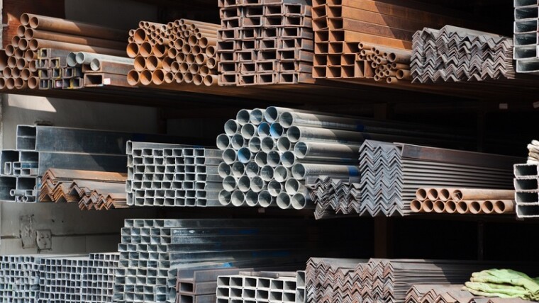 A Series Of Different Sizes Metal Pipes On Shelf